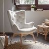 Kave Home Kody fauteuil met schapenvacht en massief beuken poten online kopen
