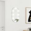 VidaXL Spiegel met LED verlichting ovaal 60x30 cm glas online kopen